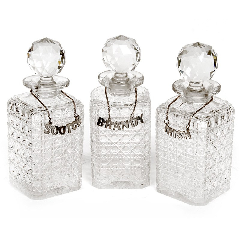 Pair of Cut Glass Silver Necked Liqueur Decanters. 1927
